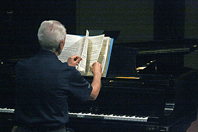photo - composer at the piano